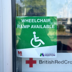Image of a widow sticker that reads &#39;wheelchair ramp available&#39;.
