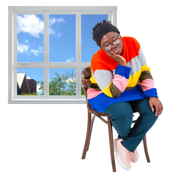 Lady sitting in front of window